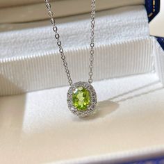 Gemstone: Natural Peridot Gem origins: Brazil  Color: light green Gem Size: 6*8MM Dimension:10.5*12.2MM  Length:16-18inch adjustable Formal Peridot Gemstone Necklaces, Elegant Lime Green Gemstone Necklace, Green Peridot Necklace In Fine Jewelry Style, Green Peridot Necklace For May Birthstone, Green Pendant Necklace With Stones, Green Peridot Pendant Necklace, Elegant Lime Green Necklace Gift, Elegant Lime Green Necklace For Gift, Oval Peridot Birthstone Necklace