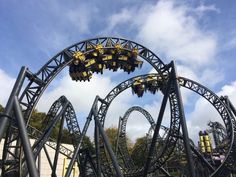 an amusement park ride with several roller coasters