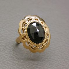 An elegant antique / vintage golden ring, handcrafted of 14 carat yellow gold, with filigree detailing. The central piece of this Victorian style ring is an oval faceted genuine red garnet of very dark red color. This ring is a high quality authentic Dutch heritage jewelry item, handcrafted in Holland circa 1950's, may be earlier. The ring will be shipped in a gift box. Garnet is the birthstone of January. It is also traditionally known as the gemstone of commitment and love.  Ring size: 17.1 mm Garnet Jewelry Set, Victorian Style Rings, Dutch Heritage, Pyrope Garnet, Heritage Jewellery, Ringe Gold, Golden Ring, Garnet Jewelry, Red Gemstones