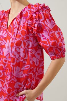 Abstract meets tropical. A fun-loving combo of a print takes on the Noche Blouse. Ruffle trim connects voluminous puff sleeves to a relaxed fit, trapeze bodice. A split neckline with a flattering tie detail sits at the center neckline. Easily style the blouse tucked into your favorite trousers or wear it untucked over your favorite breezy shorts.- Lightweight- Trapeze frame- Tie neck - Elastic cuffs- Color: Pink RedSize + Fit - Model is 5'9" and wearing size XS- Measurements taken from size S - Trendy Dress Outfits, Trendy Dress, New Print, Trendy Dresses, Cotton Style