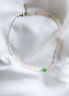 Seed Bead Necklace with Smile Necklace Luminous Beads Dainty Choker Necklace Sead Bead Jewelry Beaded Necklace ❤ BUY 2 GET 1 FOR FREE ❤ If you buy 2 items please leave the number of the third style in the ADD YOUR PERSONALISATION box.  IMPORTANT  These beads first need to get some sun or home light to glow in the dark. ❤ SIZE: Length: 36cm/ 14.17in and extender +4cm/ 1.57in Bead size: 3mm/ 0.12in ❤ PROCESSING TIME: Your product will ship within 1-2 days after purchase. ❤ SHIPPING TIME: All inter Smile Necklace, Jewellery Advent Calendar, Advent Calendar Gifts, Dainty Choker Necklace, Dainty Choker, Country Gifts, Buy Necklace, Jewelry Beaded, Seed Bead Necklace