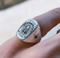 🌞 This illustration belongs to LINERWORKS brand .  TOTALLY 925 sterling silver. ORIGINAL 3 mm. on the sides of the ring.  Navy blue faceted sapphires were used. If you want a different tarot card to be engraved, you can specify it in the notes section when creating your order. The illustration is engraved on the ring.  For this reason, it is impossible for the drawing to be eroded. 🌸Gemstones on the sides can be chosen in different varieties.  🌸For example : Citrine 💛, Aquamarine 💎, Peridot Luxury Silver Art Deco Signet Ring, The Sun Tarot Card, The Sun Tarot, Silver Signet Ring, Card Illustration, Sterling Silver Cuff, Silver Cuff Bracelet, Silver Cuff, Silver Man