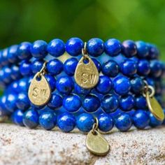 💙 Let your style blossom with our stunning Lapis Lazuli elastic bracelet. Wear it solo or team it with our Blue Spotted Jasper and Amethyst bracelets for a fresh take. You can find them all together in our Blue's Stack. STONE INFO ... Lapis lazuli is a source of wisdom and authenticity. Its velvety blue metamorphic rock has long been admired for its intense hue. During the Renaissance, this gem was ground down to make the rich shade of ultramarine for artworks. Jasper And Amethyst, Lapis Lazuli Bracelet, Metamorphic Rocks, Lapis Lazuli Beads, Elastic Thread, Bracelet Online, Amethyst Bracelet, Elastic Bracelet, Intense Colors