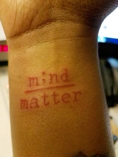 a close up of a person's wrist with a tattoo that reads mr and mrs matter