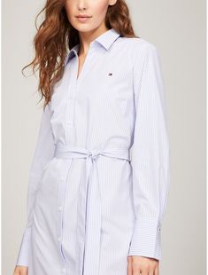 Tommy Hilfiger women's dress. Made from crisp cotton poplin with a detachable belt and button closure, our shirtdress is versatile, lightweight and comfortable.  Material: 100% Better Cotton Initiative (bci) Cotton. Tommy Hilfiger Dress Outfits, Tommy Hilfiger Outfits Women, Polo Dress Outfit, Tommy Hilfiger Outfits, Tommy Shirt, Tommy Hilfiger Belt, Tommy Hilfiger Store, Tommy Hilfiger Dress, Striped Shirt Dress