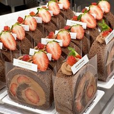 chocolate desserts with strawberries on display for sale