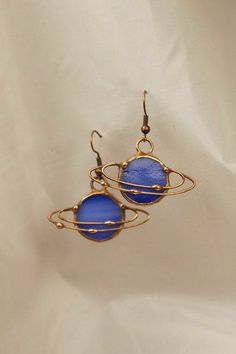 @fairlinnard Astronomy Jewelry, 00s Mode, Saturn Earrings, Space Astronomy, Planet Saturn, Dope Jewelry, Funky Jewelry, Earrings Blue, Diy Schmuck