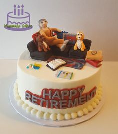 a birthday cake decorated with an image of a woman sitting on a couch and two dogs