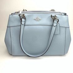 Nwt Beautiful Crossbody Pale Blue With Silver Hardware Bag By Coach. Rare. Measures 13” X 9” X 4” Thank You For Visiting My Closet! Please Check Out My Other Items Too! Happy Poshing!!! Classic Light Blue Shoulder Bag For Formal Occasions, Blue Top Handle Satchel With Silver-tone Hardware, Luxury Blue Satchel With Silver-tone Hardware, Elegant Blue Satchel With Silver-tone Hardware, Classic Light Blue Shoulder Bag For Travel, Blue Crossbody Bag With Palladium Hardware, Blue Satchel With Palladium Hardware, Classic Light Blue Shoulder Bag For Everyday Use, Blue Satchel Shoulder Bag With Palladium Hardware