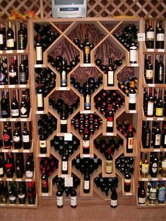 a wine rack filled with lots of bottles