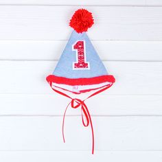 Happy 1st birthday to your little one! This cone hat with a pom pom on top is perfect cake smashing pictures. Your little one will look so adorable! First Birthday Hat, Cone Hat, First Birthday Hats, Happy 1st Birthday, Blue Boy, Happy 1st Birthdays, Birthday Hat, Perfect Cake, Birthday Celebrations