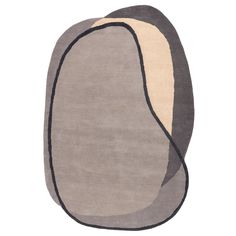 a rug with an oval shaped design in grey, beige and black colors on the floor