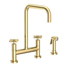 a gold faucet with two handles