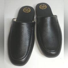 Black Leather Slippers In Excellent Condition. There Are A Few Spots On The Leather Inside From A Disinfectant Wipe, Otherwise They Look Unused. Black Synthetic Slippers With Leather Sole, Black Slippers With Leather Sole, Classic Black Slippers With Rubber Sole, Classic Black Slip-on Slippers, Elegant Black Work Slippers, Classic Black Closed Toe Mules, Classic Black Slippers For Office, Classic Black Slippers, Black Slip-on Slippers For Work