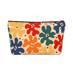 Stylish pouches can be used for pretty much anything. They make excellent pencil cases or cosmetic travel bags. 100% Polyester T-bottom 2,5 inches long With non-woven laminate inside Retains it's shape Small Large Width, in 2.6 2.88 Length, in 8 12.29 Height, in 4.53 6.93 Flowers Illustration, Pencil Cases, Travel Cosmetic Bags, Make Up Bag, Retro Flowers, Flower Illustration, Flower Making, Pencil Case, Large Black