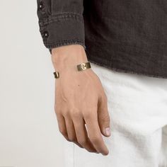 The Stavrós Gold men's cuff is 18k gold plated, marine-grade stainless steel, which twists easily into place for a secure yet comfortable fit. The brushed satin finish and laser-cut crosses are a tangible reminder of things we feel, but cannot always see. The congruence of this classic design makes it an excellent choice for a wide variety of styles. One size fits most, as it is readily adjustable. Also available in silver. This bracelet comes protected in a soft velvet pouch, with a quality car Gold Bracelet For Men, Boyfriend Bracelet, Helix Jewelry, Bracelets For Boyfriend, Leather Cord Bracelets, Great Gifts For Dad, Bracelet Mens, Bracelet Men, Braided Leather Bracelet