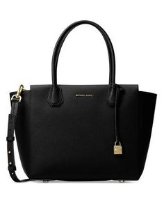 Classic sophistication translates into practical polish with spacious Mercer satchel. Made from luxuriously textured pebble leather, the Mercer can be worn on your arm by its double handles, or as a crossbody or shoulder bag by its long, slim detachable strap.Pebble leather; lining: polyesterLarge sized bag; 17-1/2"W x 11"H x 6-1/2"D7-1/2"L double handles; 17"L-19-1/2"L adjustable and detachable strapTop-zip closureExterior logo, feet and lock charm1 interior zip pocket and 1 slip pocketLaptop c Sac Michael Kors, Elegant Handbags, Trendy Purses, Michael Kors Backpack, Shopping Gifts, Michael Kors Mercer, Michael Kors Selma, Michael Kors Satchel, Mk Handbags