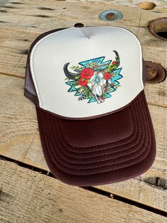 Embrace trendy cowgirl vibes with this Western Trucker Hat featuring a stylish gold chain detail designed specifically for women. The Southwestern Aztec Bull Print adds a touch of retro nostalgia to this modern accessory, perfect for adding a unique flair to any outfit. The foam front provides a comfortable fit for all-day wear, making this hat a must-have addition to your collection for a touch of Southwestern charm. Western Trucker Hat, Cowgirl Vibes, Retro Western, Retro Nostalgia, Modern Accessories, Cow Girl, Trucker Cap, Gold Chain, Gold Chains