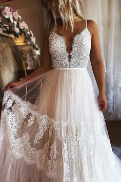 Details: Silhouette: A-Line Style Fabric: Lace Fabric Color: White Color Length: Sweep Train Neckline: Spaghetti-Straps Neckline Sleeves: Sleeveless Back: Lace-Up Back Embellishment: Appliqued