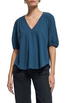 Get comfortable in this floaty pima-cotton-and-hemp top that's framed by puff sleeves and finished with a curved hem. 25" length V-neck Elbow-length sleeves Curved hem 75% pima cotton, 25% hemp Machine wash, tumble dry Made in Peru Casual Billowy V-neck Tops, Casual Tops With Billowy Blouson Sleeves, Casual Top With Gathered Balloon Sleeves, Casual Tops With Gathered Balloon Sleeves, Summer Cotton Tops With Gathered Sleeves, Casual Billowy Tops With Puff Sleeves, Casual Billowy Puff Sleeve Tops, Billowy Blue Summer Top, Billowy Blue Top For Summer