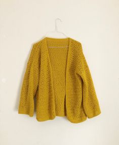 Crochet cardigan, 30 hours of work, made of acrylic wool with half double and double stitch, very slightly transparent. wide sleeves with waistband, no buttons. Size S/meter Handmade Yellow Sweater For Fall, Yellow Knitted Cardigan For Spring, Hand Knitted Yellow Sweater For Spring, Yellow Open Knit Sweater For Winter, Fall Crochet Cardigan In Acrylic Yarn, Yellow Knit Cardigan For Layering, Handmade Yellow Cardigan For Winter, Yellow Crochet Knit Sweater, Yellow Cardigan Crochet