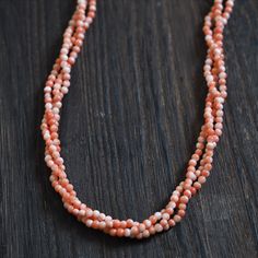 Type of metal: German Silver (Nickel Silver) Full length: 52cm/20.5inches ※including clasp Beads size: 3.5-4mm ※Size is approx. Type of coral: Natural Japanese coral (not dyed) Shape: Round Scratches/dents/cracks: There's scratches & cracks on the surface 【 All corals dealing in our shop are natural 】 Not dyed, Not treated, Not enhanced. Cut and polish only. Corals have natural scratches and dents and cracks. Please kindly note that as a natural proof. If you have any questions about the product 3 Strand Twist, Twisted Necklace, Coral Beads Necklace, Coral Jewelry, Nickel Silver, German Silver, Coral Beads, Types Of Metal, Light Pink