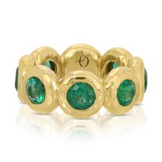 Nesting Gem Eternity Ring - Emerald - Jumbo Stackable Emerald Ring In Yellow Gold, Gold Emerald Ring With Halo, Gold Emerald Ring With Round Band, Stackable Round Cut Emerald Ring In Yellow Gold, Yellow Gold Stackable Round Cut Emerald Ring, Luxury Round Emerald Ring With Bezel Setting, Round Yellow Gold Emerald Ring, Yellow Gold Emerald Ring With Halo Setting, Yellow Gold Emerald Halo Ring For May Birthstone