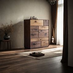 a wooden dresser sitting on top of a hard wood floor