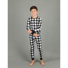 The Kid’s Two Piece Cotton Pajamas are the ideal outfits for matching with the rest of the comfy family. Each product comes with a two-piece set featuring a long-sleeved shirt and comfy bottoms, both utilizing ribbed cuffs at the ankles and wrists to bolster the overall slim feeling. Pajamas come made with cozy cotton material to complement the convenient tagless labels, perfect for those nights of lounging around the house. Wearers can choose many unique designs to bring out their best fashion, Matching Cotton Sleepwear For Winter, Matching Winter Loungewear Sets, Matching Loungewear Sets For Winter, Black Loungewear Sets For Winter, Black Loungewear Sets For Fall, Black Sets For Fall Loungewear, Black Cotton Sleepwear For Christmas, Matching Long Sleeve Winter Sleepwear, White Matching Winter Sleepwear