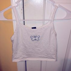 Never Worn Super Cute Spring White Cotton Crop Top, White Cotton Crop Top For Spring, White Casual Crop Top For Spring, White Y2k Tank Top For Spring, Blue Y2k Tank Top For Spring, Y2k White Camisole Tank Top, Y2k Crew Neck Cotton Tank Top, Butterfly Tank Top, White Blue