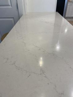 a white counter top in a kitchen