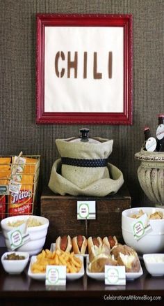 a buffet table filled with different types of food and snacks on it's sides