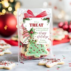 a package of decorated christmas cookies sitting on top of a table