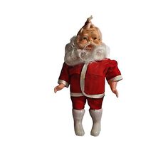 a santa clause doll is standing in front of a white background