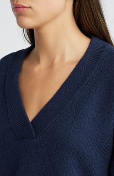 An oversized fit feels so right and relaxed in this V-neck sweater knit from cotton-blend yarn. V-neck Long sleeves Dropped shoulders Ribbed cuffs and hem 56% cotton, 19% acrylic, 18% polyester, 5% nylon, 2% spandex Hand wash, dry flat Imported Winter Relaxed Fit V-neck Sweater, Oversized V-neck Sweater For Layering, Oversized V-neck Sweater With Ribbed Cuffs, Knit V-neck Sweater With Ribbed Cuffs, V-neck Sweater For Loungewear, Relaxed Fit V-neck Sweater For Fall, Classic V-neck Sweater For Loungewear, Relaxed Fit V-neck Sweater For Winter, V-neck Cashmere Sweater For Loungewear