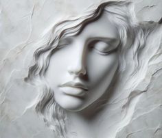 a white sculpture with long hair and eyes closed