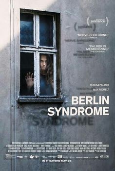 a movie poster for berlin syndrome with a woman looking out the window and holding her hand up