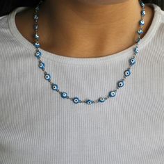 Get ready to have all eyes on you with our Nazar Necklace! This stunning necklace will make any outfit stand out. Complete the set with our Nazar Bracelet and Nazar Anklet! Blue Beaded Chain Necklace, Adjustable Blue Chain Necklace, Spiritual Blue Choker Jewelry, Adjustable Blue Chain Necklace As Gift, Adjustable Blue Chain Necklace For Gift, Blue Adjustable Chain Choker Jewelry, Blue Beaded Chain Necklace As Gift, Blue Choker Jewelry For Jewelry Making, Blue Choker As A Gift