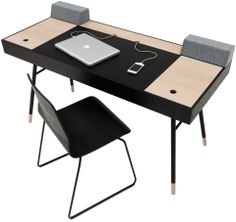 a computer desk with two chairs and a laptop on the top, one chair has a mouse pad in front of it