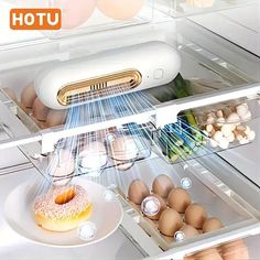 an open refrigerator filled with eggs and donuts