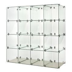 a large glass display case with metal handles and knobs on each side, holding several shelves