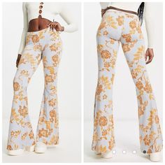 Nwt Free People Floral Bell-Bottoms Floral Print High Rise Elasticized Waistband Flared Skinny Fit New With Tags Size M B70 Retro Stretch Printed Bottoms, Retro Printed Bottoms, Retro Fitted Printed Bottoms, Printed Wide Leg Orange Bottoms, Orange Printed Wide Leg Bottoms, Printed Fitted Bottoms For Loungewear, Fitted Printed Loungewear Bottoms, Printed Fitted Pants For Loungewear, Fitted Printed Pants For Loungewear