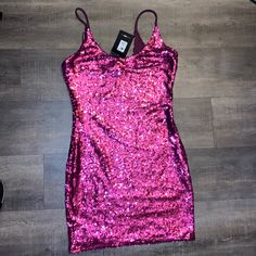 Fashion Nova Pink Glitter Dress Size Large Perfect For Your Next Party! Pink Glitter Dress For Spring, Pink Glitter Dresses For Spring, Spring Pink Glitter Dress, Pink Sequin Dress With Glitter For Holidays, Holiday Pink Sequin Dress With Glitter, Pink Sequin Glitter Dress For Holiday, Glitter Mini Dress For Prom Party Season, Holiday Pink Sequin Glitter Dress, Pink Glitter Dress For Party Season