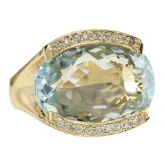 Stamped: 14K Yellow GoldTotal Ring Weight: 12.5 GramsRing Length: N/ARing Width: N/AGemstone Weight: Total Natural Aquamarine Weight is 25.00 Carat (Measures: 12.30x19.90 mm)Color: BlueDiamond Weight: Total Natural Diamond Weight is 0.35 CaratColor: F-G, Clarity: VS2-SI1Face Measures: 17.00x19.90 mmSku: [702906W] Yellow Gold Diamond Ring, Gold Diamond Ring, Natural Aquamarine, Gold Diamond Rings, Aquamarine, Natural Diamonds, Gold Diamond, Diamond Ring, Gold Bracelet