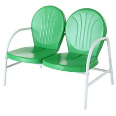 two green plastic chairs sitting next to each other