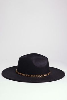 - Suede felt fedora- Solid color fedora - Gold chain fedora- Panama style fedora- Wide brim - Classic fedora hat- Fashion hat- Fall fedora- Winter fedora- Summer fedora- Spring fedora- Lightweight and comfortable fit - Casual luxury- Approximate measurements: Height: 4", brim: 3.5", circumference: 47.5"Style: casualMaterial Composition: - 100% polyester Winter Fedora, Fedora Hat Style, Panama Style, Summer Fedora, Women Fedora, Chic Fashionista, Casual Luxury, Wide Brim Fedora, Felt Fedora