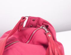 "This is the mini version of the Kallia bag.For those who aren't used in carrying large purses,this is the ideal size.Still roomy enough to carry your daily essentials inside but in a smaller size. This slouch bag was made using a pink cotton canvas and genuine leather for the handle and zipper pulls. All the leather parts can be removed from the bag so it is easier to clean it ,in case it gets dirty.Not to mention that you can order extra handles and zipper pulls and interchange the colors depe Cotton Shoulder Bag With Adjustable Strap For Errands, Pink Casual Hobo Bag, Pink Hobo Bag With Zipper For Daily Use, Travel Cotton Hobo Bag With Removable Pouch, Pink Tote Hobo Bag For Errands, Canvas Hobo Bag With Removable Pouch For Errands, Pink Hobo Bag With Zipper For Everyday, Pink Hobo Bag For Daily Use, Versatile Pink Hobo Bag