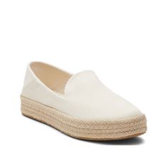 TOMS-Carolina Platform Espadrille Slip-On - Women's Liven up your casual fit with the Carolina espadrille slip-on from Toms. With a platform sole to heighten the mood, this pair sports Custom CloudBound™ insoles for additional support. About the Brand: Toms believes in a future where all people have the chance to thrive! Toms invests one-third of their profits in support of grassroots efforts , partnering with organizations at the local level to boost mental health, increase access to opportunit Casual Natural Color Slip-ons For Spring, White Summer Slip-ons For Everyday, Casual Slip-ons With Woven Sole For Vacation, Everyday Spring Slip-ons With Woven Sole, White Everyday Slip-ons For Summer, White Summer Everyday Slip-ons, Natural Canvas Casual Espadrilles, Everyday White Summer Slip-ons, White Everyday Summer Slip-ons