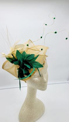 Beautiful gold sinamay Fascinator accented with gold and green feathers. Bridesmaids Hat Kentucky Derby Cocktail Party Tea Party Guest Easter Kate - Ready to ship - Lightweight - Free Shipping - Fast shipping - Customize by adding different color flowers and or feathers Check my store for for styles and colors. Hatsandpearls.etsy.com Find more at my website: Www.hatsandpearls.com reach out to me if you can't find what you are looking for. I can make cake custom orders and help you style and matc Gold Short Brim Fascinator For Kentucky Derby, Gold Summer Fascinator For Garden Party, Gold Curved Brim Fascinator For Spring, Gold Costume Hat For Royal Ascot, Gold Mini Hat For Formal Spring Occasions, Formal Gold Mini Hat For Spring, Formal Spring Mini Hat In Gold, Gold Hat Fascinator For Royal Ascot, Gold Fascinator For Royal Ascot Races