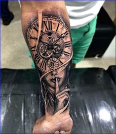 a person with a clock tattoo on their arm